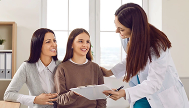 Mom Daughter Talking with Doctor