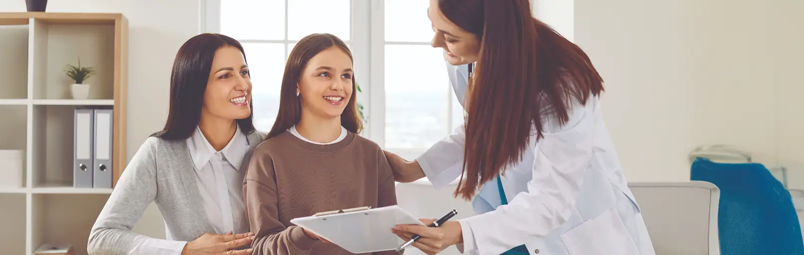Mom Daughter Talking with Doctor